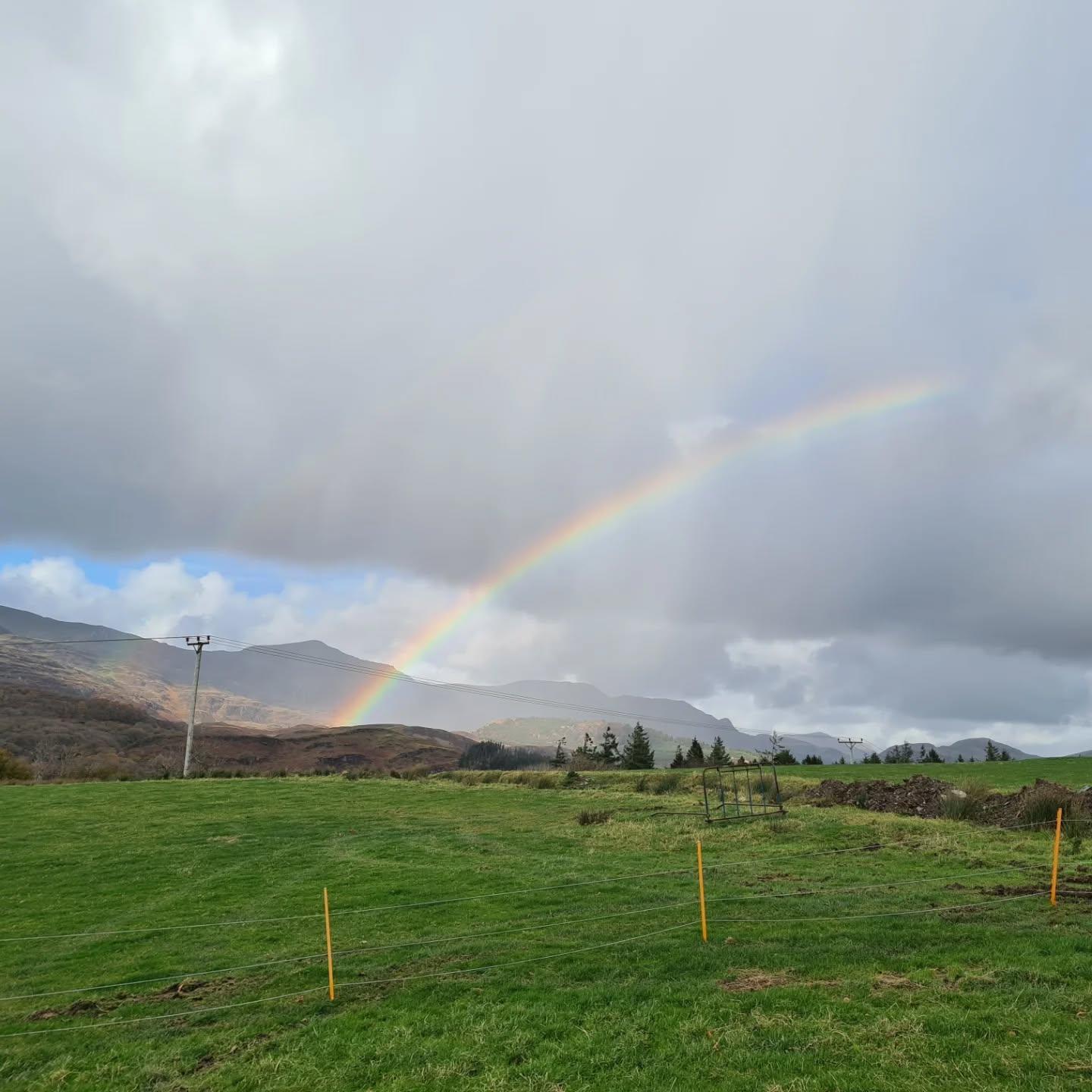 Rainbow over the fields at Castle Peak Views